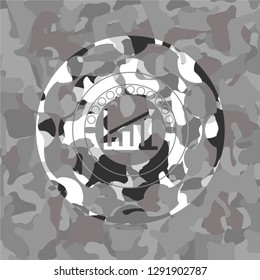 growth chart icon inside grey camo texture