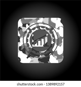 growth chart icon inside grey camouflage texture