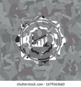 growth chart icon inside grey camouflage emblem