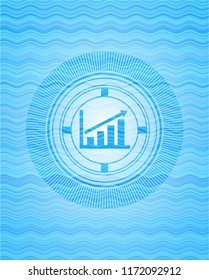 growth chart icon inside light blue water wave style badge.