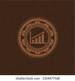 growth chart icon inside realistic wooden emblem