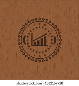 growth chart icon inside realistic wood emblem