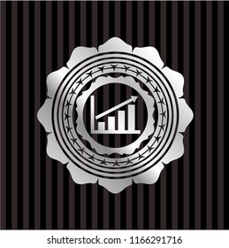 growth chart icon inside silvery emblem