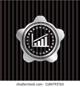 growth chart icon inside silvery emblem