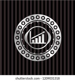 growth chart icon inside silvery badge
