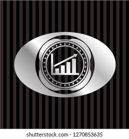 growth chart icon inside silvery badge or emblem