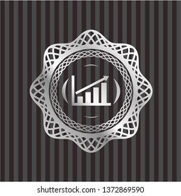 growth chart icon inside silvery badge