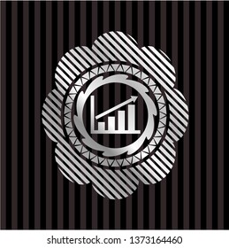 growth chart icon inside silvery badge or emblem