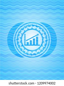 growth chart icon inside sky blue water wave badge.