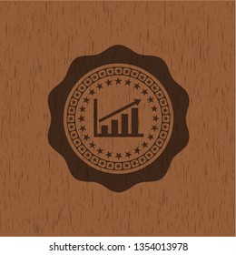 growth chart icon inside vintage wood emblem