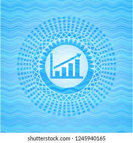 growth chart icon inside water wavec oncept emblem.