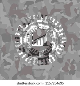 growth chart icon on grey camouflage texture