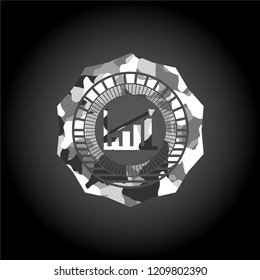 growth chart icon on grey camouflaged texture