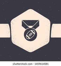 Grunge American Football ball with medal icon isolated on grey background. Monochrome vintage drawing. Vector Illustration
