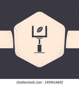 Grunge American football goal post and football ball icon isolated on grey background. Monochrome vintage drawing. Vector Illustration