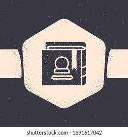 Grunge Ancient magic book with alchemy recipes and mystic spells and enchantments icon isolated on grey background. Monochrome vintage drawing. Vector Illustration