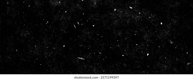 A grunge background with a black background, featuring a speckled texture. The background is dark and gritty, with a black, dusty appearance. Minimal grunge speckled texture vector background