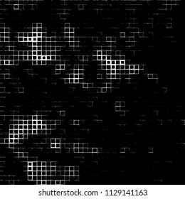 Grunge background of black squares randomly placed on a white background