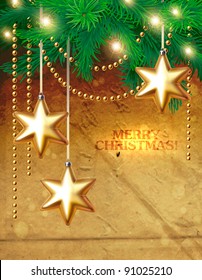 Grunge background with christmas tree branches decorated with golden stars and beads