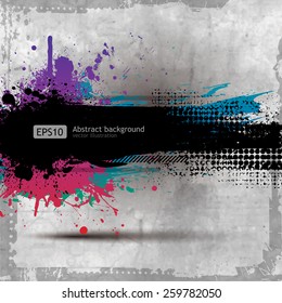 Grunge background with a colorful rainbow ink splat effect