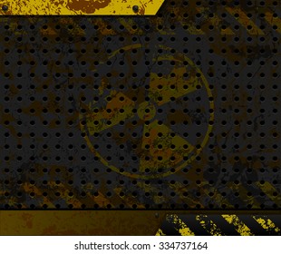 Grunge background. Perforated rusty metal and radioactive sign.