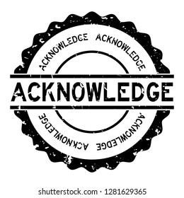 Grunge black acknowledge word round rubber seal stamp on white background