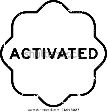Grunge black activated word rubber seal stamp on white background