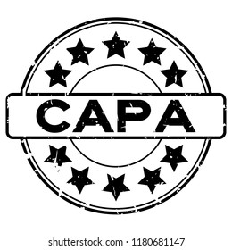 Grunge black CAPA (abbreviation of corrective action and preventive action) word with star icon round rubber seal stamp on white background