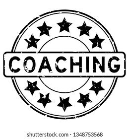 Grunge black coaching word with star icon round rubber seal stamp on white background