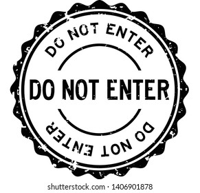 Grunge black do not enter word round rubber seal stamp on white background