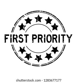 Grunge Black First Priority Word With Star Icon Round Rubber Seal Stamp On White Background