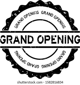Grunge black grand opening word round rubber seal stamp on white background