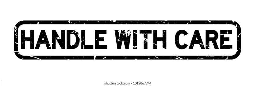 Grunge black handle with care square rubber seal stamp on white background