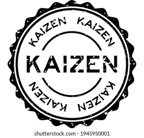 Grunge black kaizen word round rubber seal stamp on white background