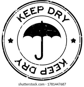 Grunge black keep dry word round rubber seal stamp on white background