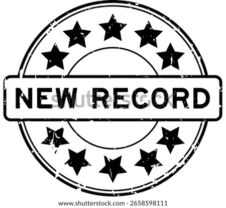 Grunge black new record word round rubber seal stamp on white background
