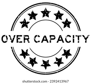Grunge black over capacity word with star icon round rubber seal stamp on white background