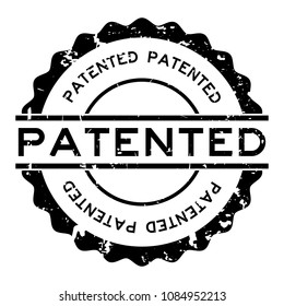 Grunge black patented word round rubber seal stamp on white background