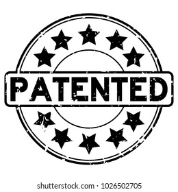 Grunge black patented word with star icon round rubber seal stamp on white background
