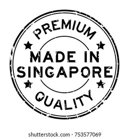 Grunge black premium quality made in Singapore round rubber business seal stamp on white background