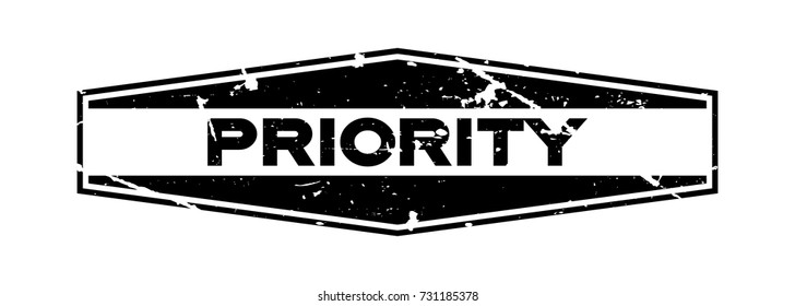 Grunge black priority wording hexagon rubber seal stamp on white background