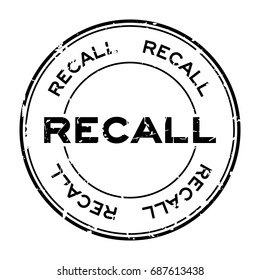 Grunge black recall round rubber seal stamp on white background