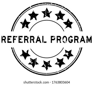 Grunge black referral program word with star icon round rubber seal stamp on white background