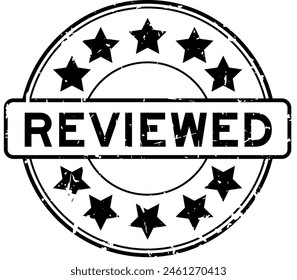 Grunge black reviewed word round rubber seal stamp on white background