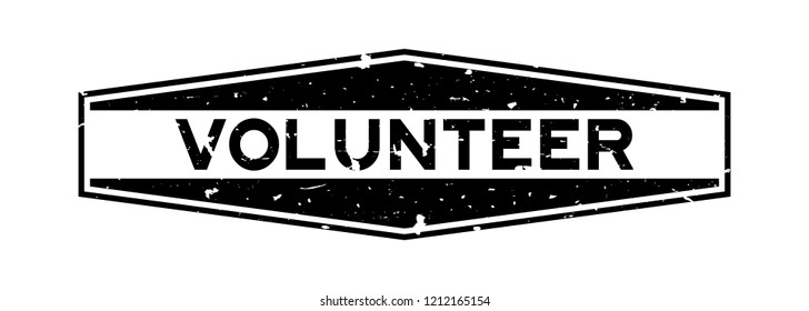 Grunge black volunteer word hexagon rubber seal stamp on white background