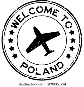 Grunge black welcome to Poland word with airplane icon round rubber seal stamp on white background