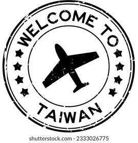 Grunge black welcome to taiwan with airplane icon round rubber seal stamp on white background