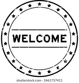 Grunge black welcome word round rubber seal stamp on white background