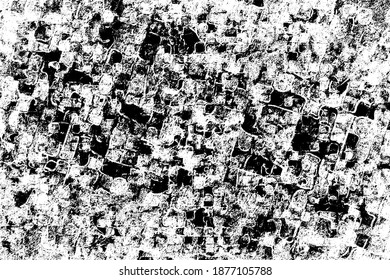 Grunge black and white texture. Pattern of scratches, chips, wear, and scuffs. Monochrome vintage background. Pattern of dirt, dust