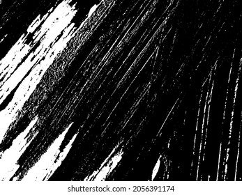 Grunge is black and white. Texture of black strokes on a white background. Abstract chaotic movements with a dry brush. Monochrome pattern of worn surface